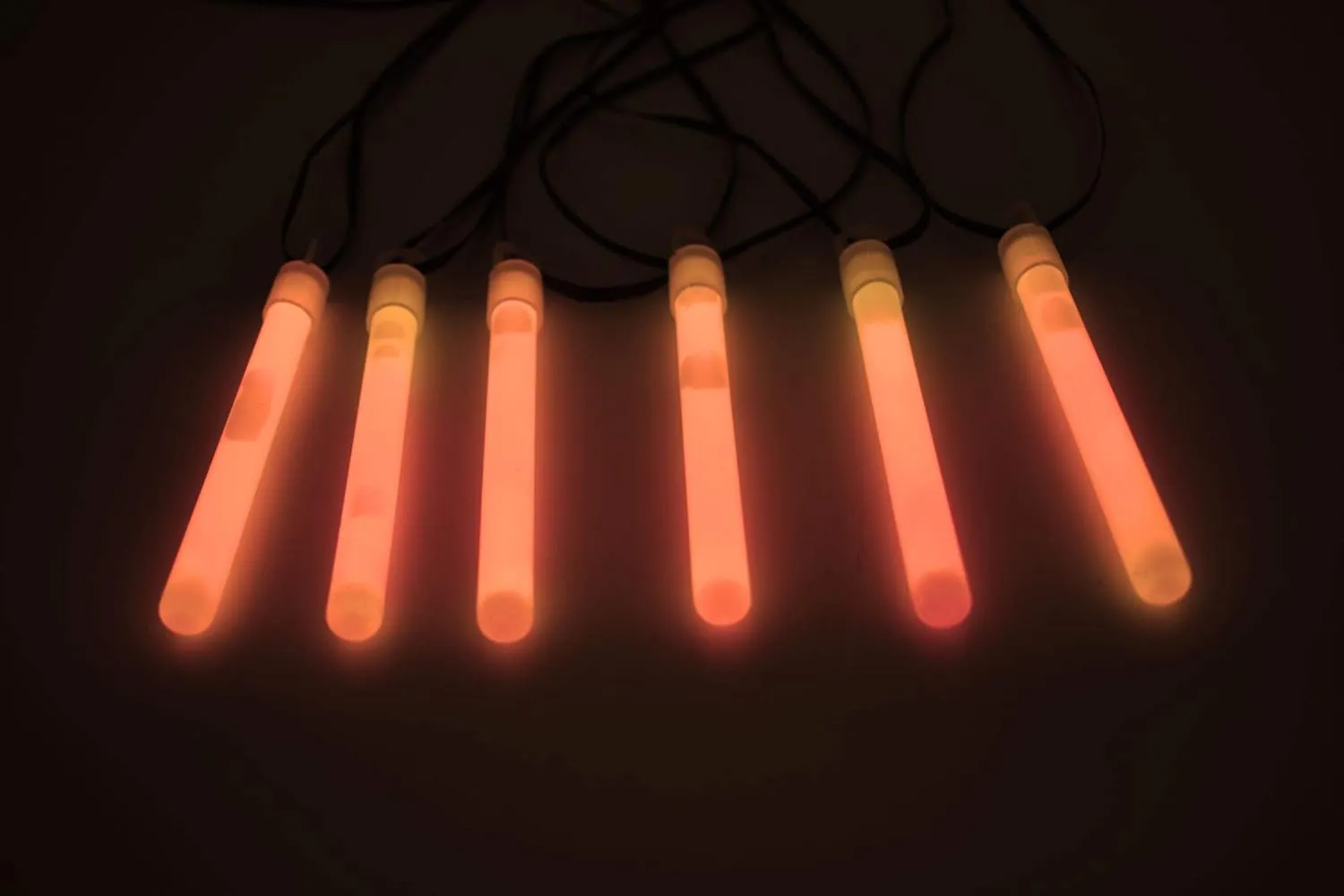 DirectGlow 4 inch Premium Bright Neon Glow Sticks with Lanyards Glow Party Supply Birthday Holiday 10-12 Hour Glow (Orange, 100 Count)